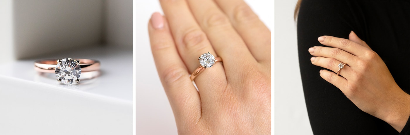 Solitaire prong-set simulated diamond engagement ring.