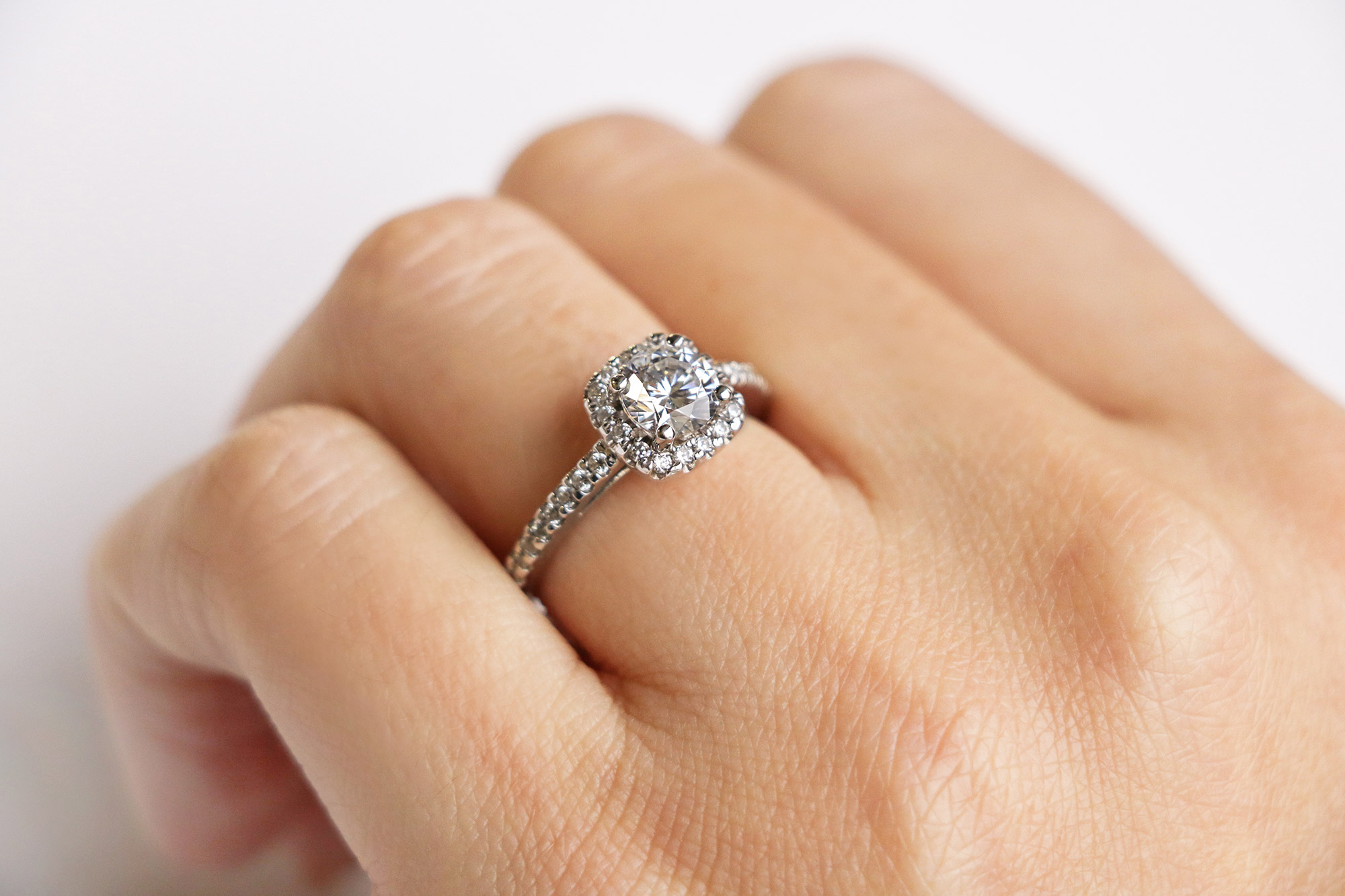 An accented halo engagement ring from Diamond Nexus.