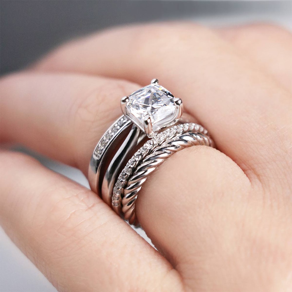 A unique white gold wedding ring stack from Diamond Nexus.