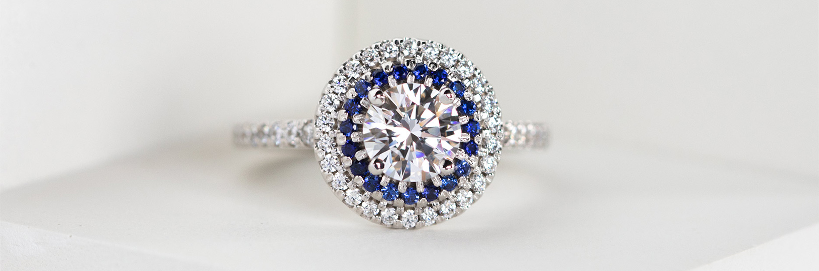 Halo sapphire engagement ring.