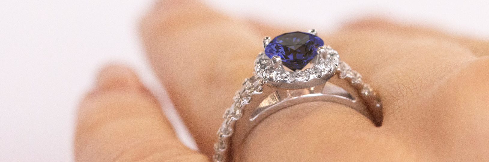 Accented sapphire engagement ring.