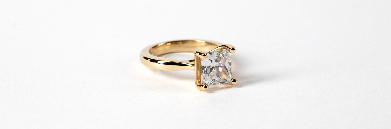 small yellow gold engagement ring