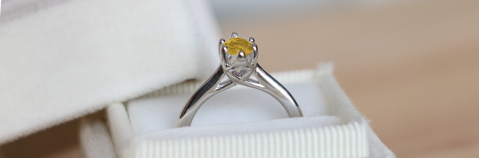 Yellow simulated diamond engagement ring