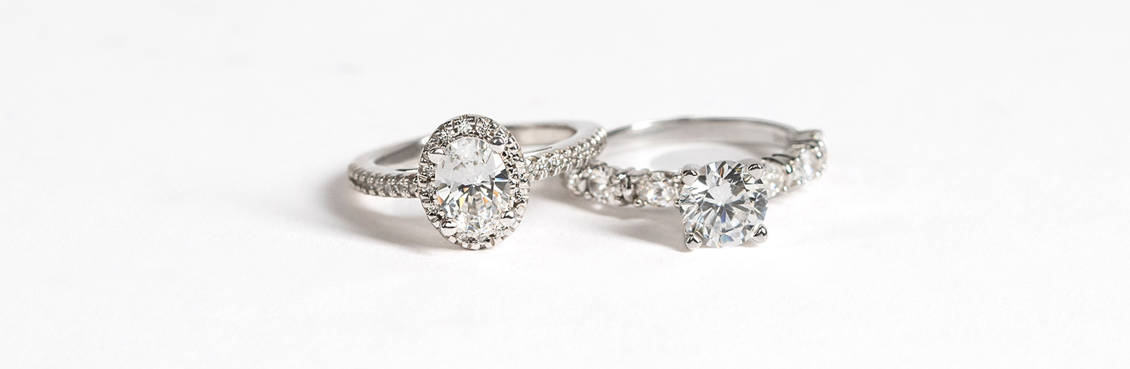 Two engagement rings compared side by side