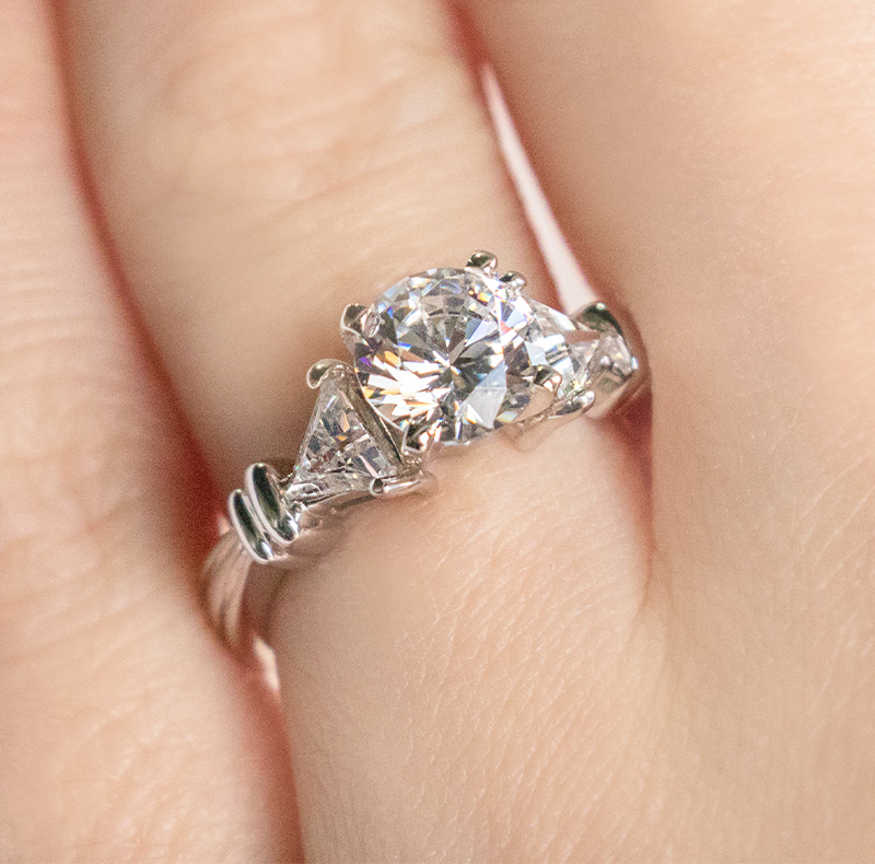 The romantic three stone engagement ring setting