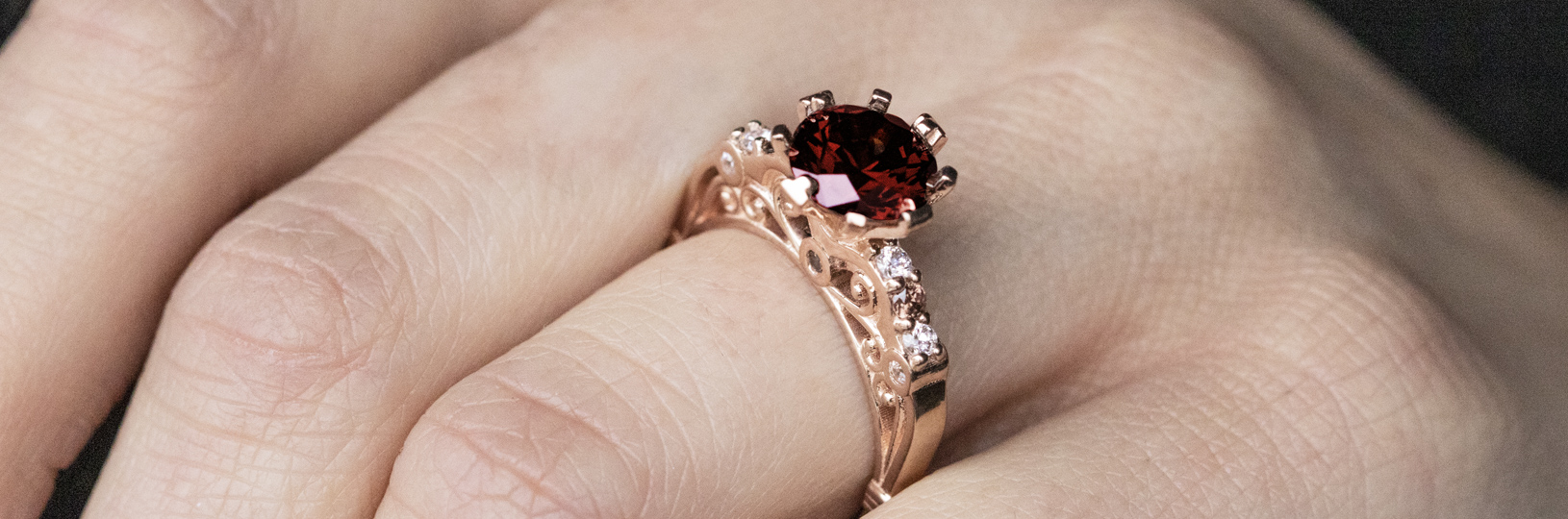 Accented ruby engagement ring