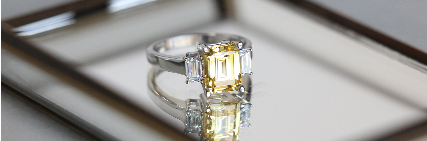 Three stone gemstone engagement ring