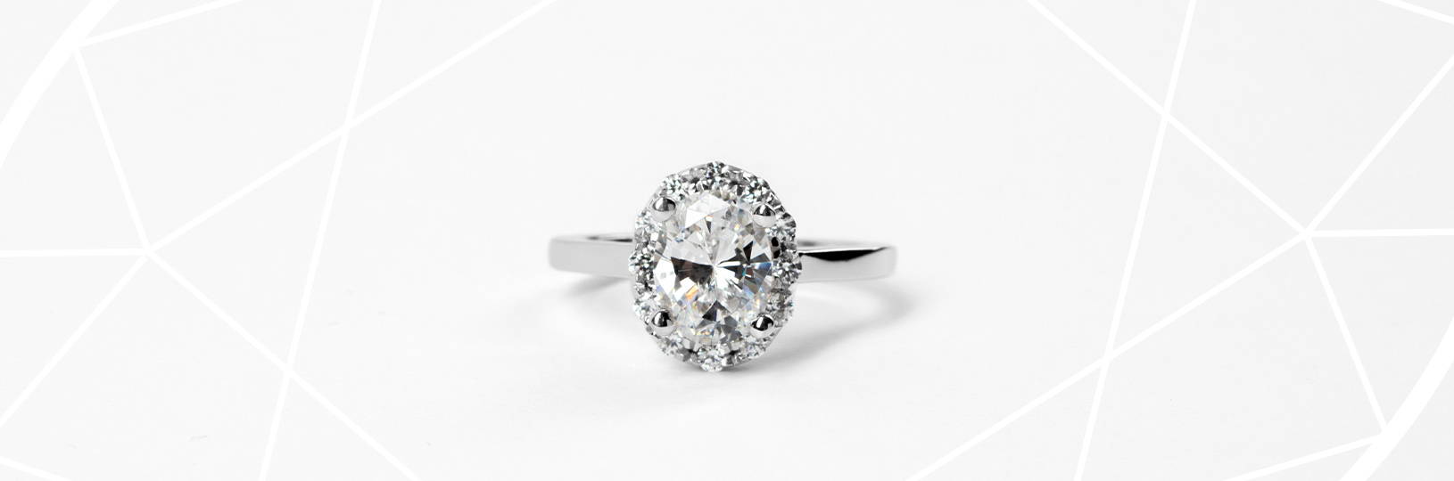 An engagement ring featuring an oval cut stone