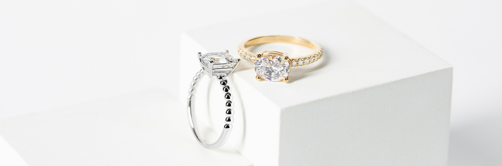 A white gold ring and a yellow gold ring