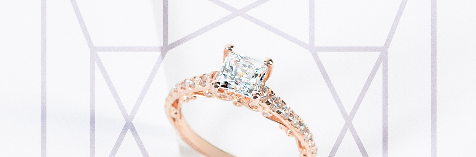 An engagement ring featuring a princess cut stone
