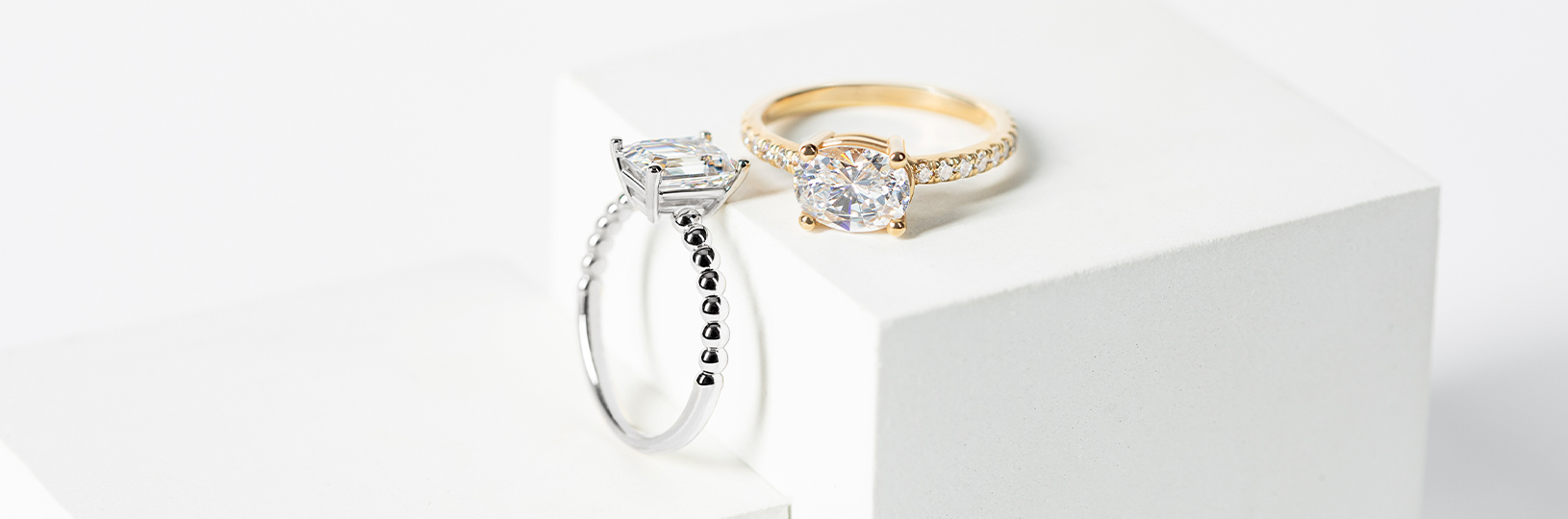 A white gold and a yellow gold engagement ring