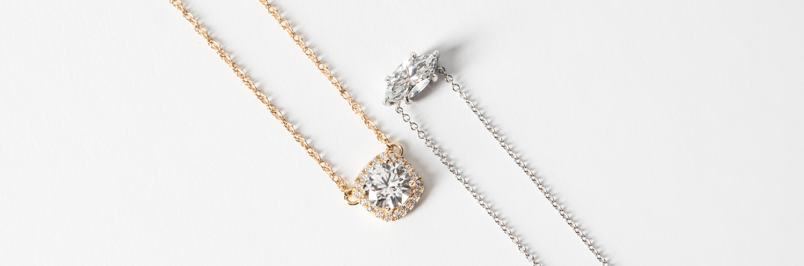 Two necklaces, one in yellow gold, the other in white gold