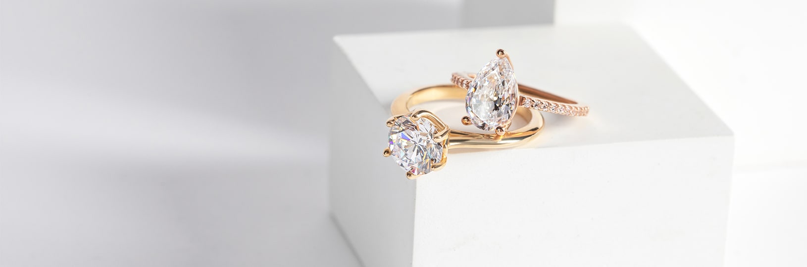 Two engagement rings compared side-by-side