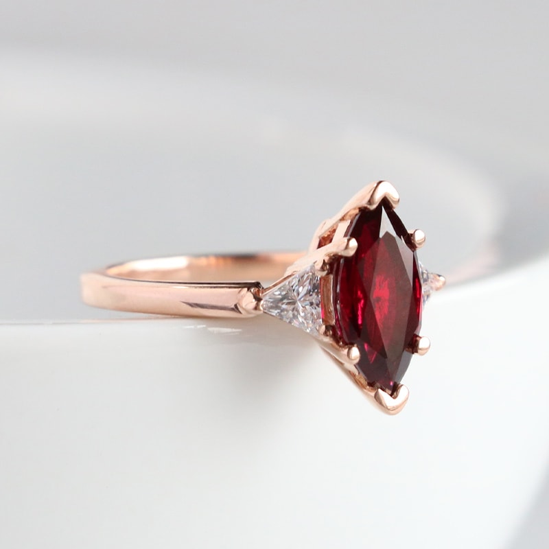 A ruby stone in a solitaire setting