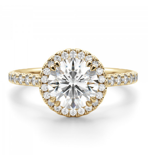 A round cut stone in a halo engagement ring setting