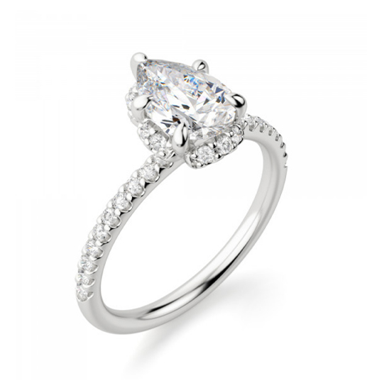 A pear cut stone in an accented hidden halo setting