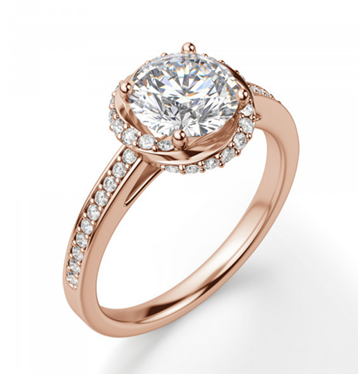 A Halo engagement ring with an accented band