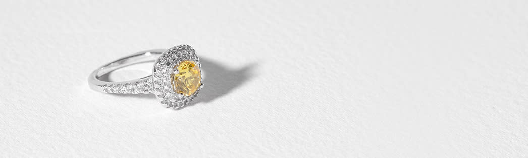 Clearance fashion ring with canary center stone