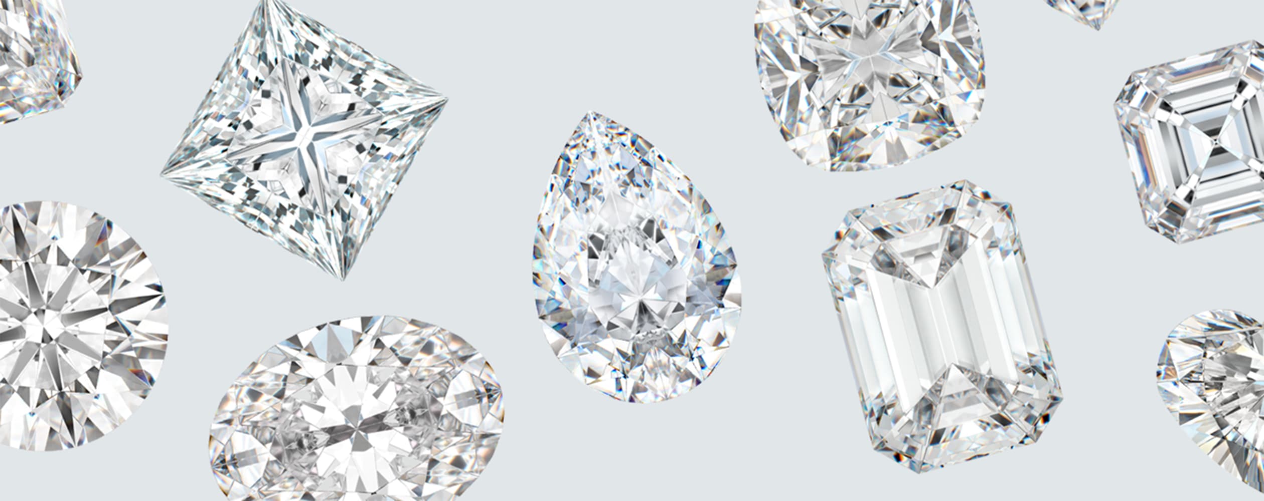 https://assets.diamondnexus.com/images/w_2520,h_1000/f_auto,q_auto/v1664477990/diamond_nexus/blog/2022/september/what-is-cubic-zirconia/Stones_Desktop/Stones_Desktop.jpg?_i=AA