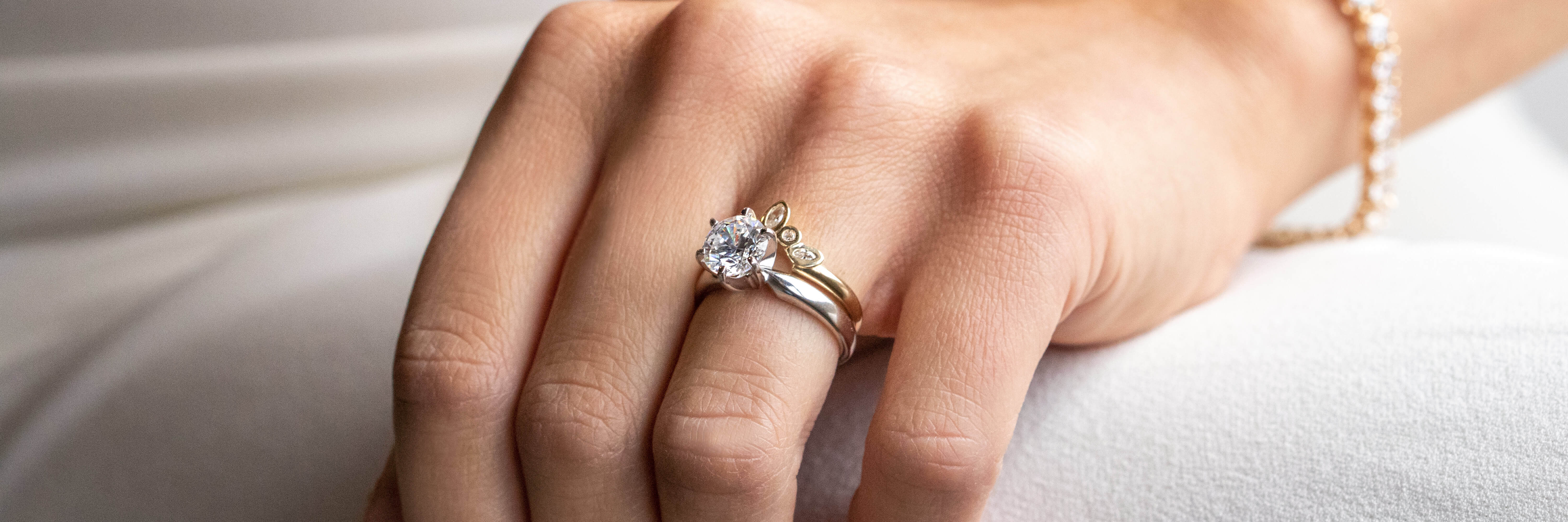 simple solitaire engagement ring with stacked wedding band