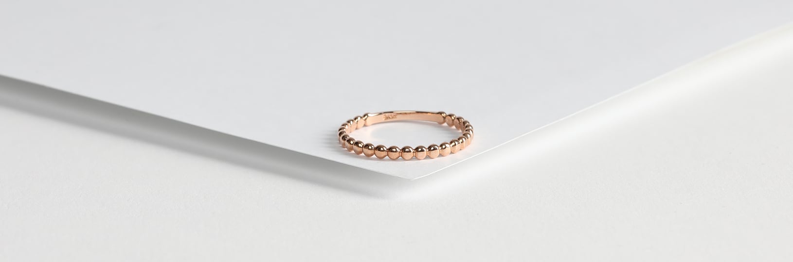 Simple rose gold wedding ring.