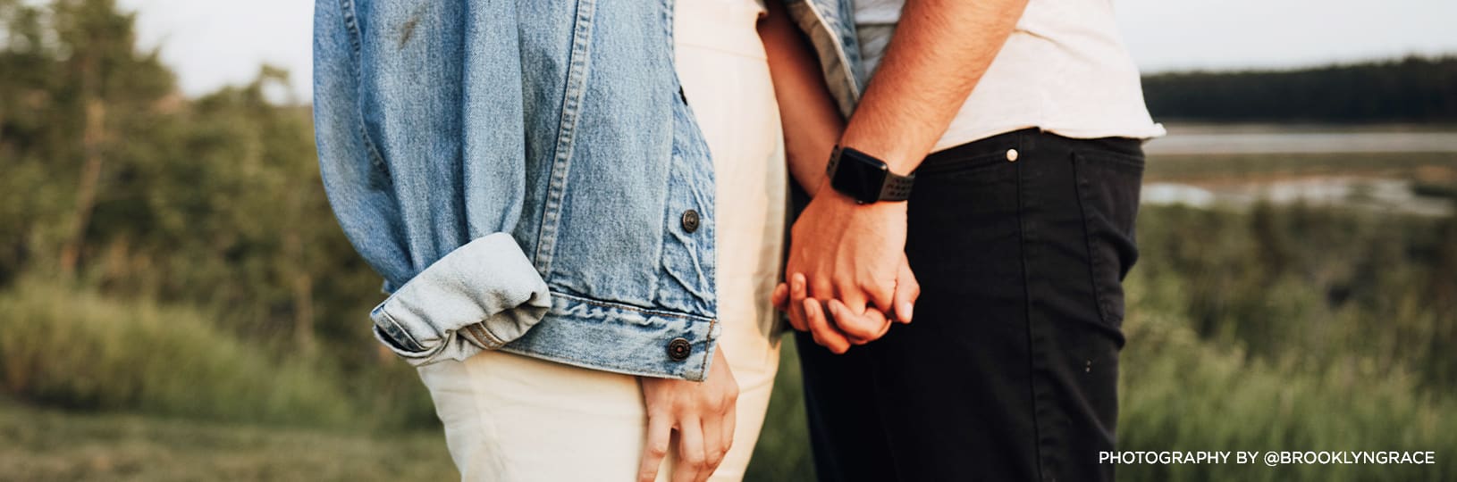 Photo of a couple holding hands