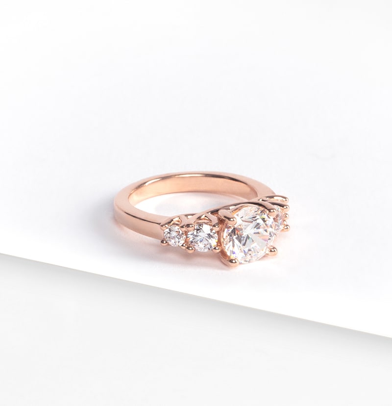 A five stone rose gold engagement ring