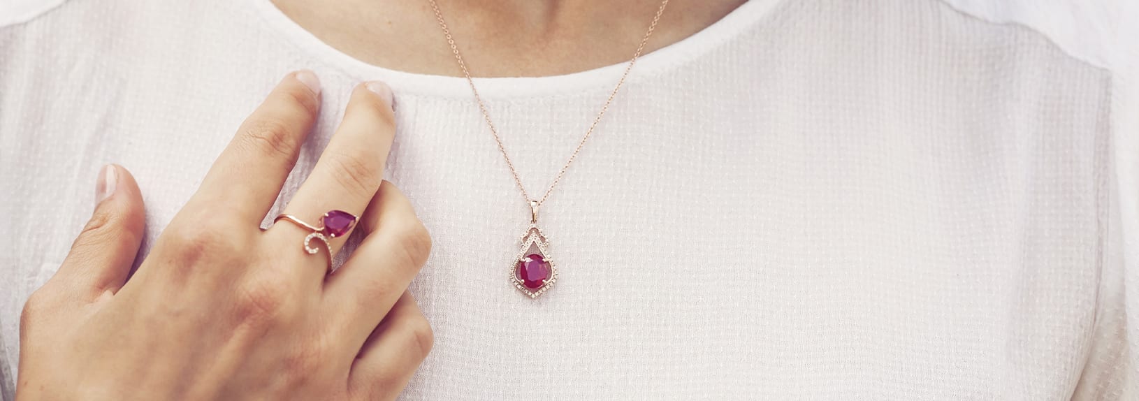 A necklace and ring featuring January's birthstone